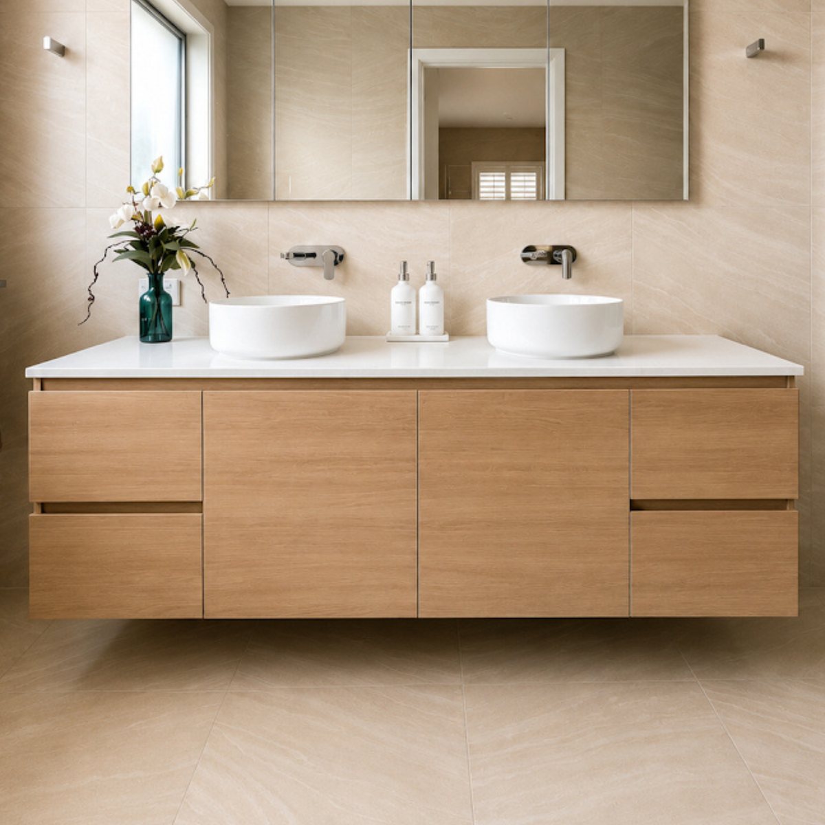 Posh Domaine wall hung vanity with a solid surface top and two round basins
